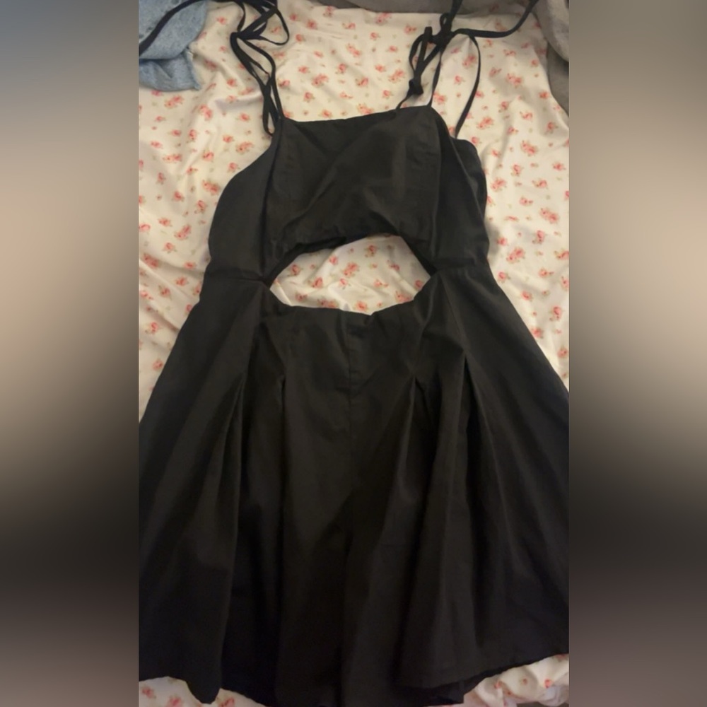 Here is this super cute black dress! It has only been worn once and not damaged
